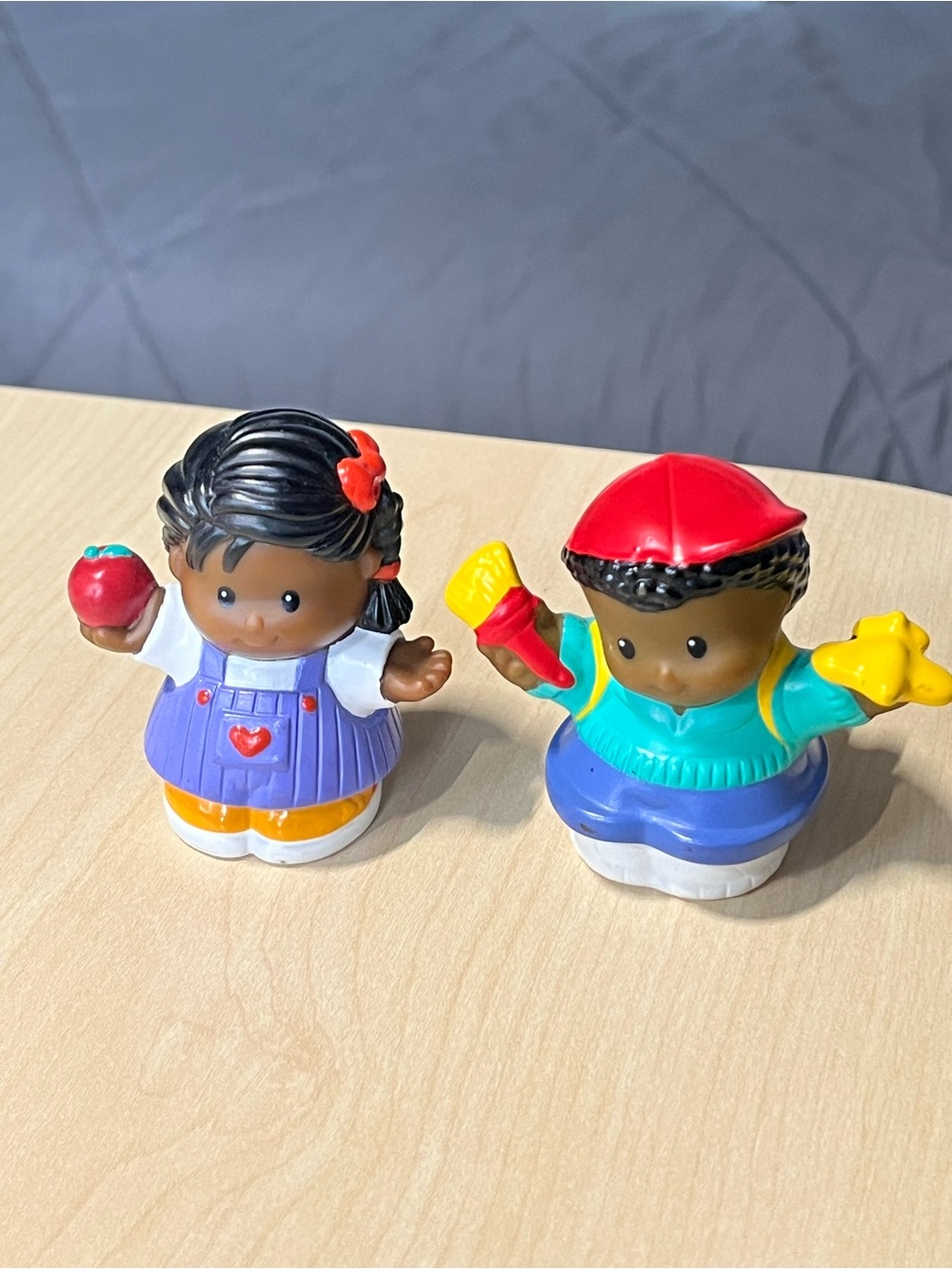 Two fisher price little people - two kids! These are from 1998!